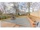 Backyard area featuring a patio with outdoor seating, gravel, a deck, and a fenced yard at 389 Kendrick Se Ave, Atlanta, GA 30315