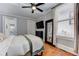 Comfortable bedroom featuring natural light, hardwood floors, and neutral decor at 389 Kendrick Se Ave, Atlanta, GA 30315