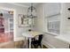 A cozy eat-in kitchen with a round table, shiplap wall and lots of natural light at 389 Kendrick Se Ave, Atlanta, GA 30315