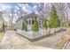Charming home with an inviting front porch, white picket fence and long private driveway at 389 Kendrick Se Ave, Atlanta, GA 30315