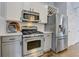 Modern kitchen features stainless steel appliances and ample cabinet space for culinary enthusiasts at 389 Kendrick Se Ave, Atlanta, GA 30315