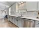 Well-lit kitchen features sleek countertops, stainless steel appliances, and modern cabinetry at 389 Kendrick Se Ave, Atlanta, GA 30315