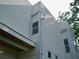 Exterior of the house showing siding and security camera at 48 Moury Se Ave, Atlanta, GA 30315