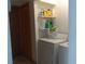 Laundry room with washer, dryer, and storage shelves at 48 Moury Se Ave, Atlanta, GA 30315