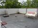 Relaxing roof deck featuring a swing and potted plants at 48 Moury Se Ave, Atlanta, GA 30315