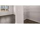Walk-in closet with wire shelving at 5435 Flat Rock Pt, Stonecrest, GA 30038