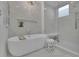 Spa-like bathroom featuring a soaking tub and a large walk-in shower at 115 17Th Street Ne, Atlanta, GA 30309