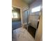 Bathroom with marble shower and bench seating at 269 Lakeside Pl, Canton, GA 30114