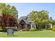 Community clubhouse with landscaping and signage at 269 Lakeside Pl, Canton, GA 30114