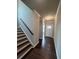 Bright foyer with hardwood floors and elegant staircase at 269 Lakeside Pl, Canton, GA 30114