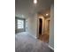 Upstairs hallway with carpet, bedrooms, and a bathroom at 269 Lakeside Pl, Canton, GA 30114