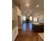 Open kitchen features granite countertops, stainless steel appliances, and an island at 269 Lakeside Pl, Canton, GA 30114