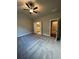 Spacious main bedroom with carpet and en-suite bathroom access at 269 Lakeside Pl, Canton, GA 30114