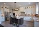 Gourmet kitchen with stainless steel appliances, granite countertops, and a center island at 11360 Bennett Ln, Johns Creek, GA 30097