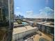 Stunning aerial view of the complex, showcasing the pool and surrounding buildings at 1280 W Peachtree W St # 1407, Atlanta, GA 30309