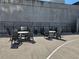 Outdoor grilling area with seating and modern grills at 1280 W Peachtree W St # 1407, Atlanta, GA 30309