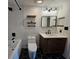 Modern bathroom with hexagon tile floors and floating vanity at 1280 W Peachtree W St # 1407, Atlanta, GA 30309
