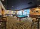 Game room boasts two pool tables and comfortable seating at 1280 W Peachtree W St # 1407, Atlanta, GA 30309