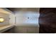 Bright hallway with wood floors and built-in shelving at 1280 W Peachtree W St # 1407, Atlanta, GA 30309