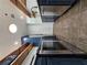 Modern kitchen with stainless steel appliances and blue cabinets at 1280 W Peachtree W St # 1407, Atlanta, GA 30309