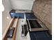 Modern kitchen with stainless steel appliances and blue cabinets at 1280 W Peachtree W St # 1407, Atlanta, GA 30309