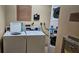 Convenient in-unit laundry with modern washer and dryer at 1280 W Peachtree W St # 1407, Atlanta, GA 30309