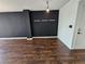 Bright and spacious living room with dark hardwood floors and large windows at 1280 W Peachtree W St # 1407, Atlanta, GA 30309