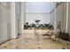 Lobby area with seating, plants, and a tranquil atmosphere at 1280 W Peachtree W St # 1407, Atlanta, GA 30309