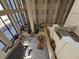 High-ceiling lobby with seating, plants, and natural light at 1280 W Peachtree W St # 1407, Atlanta, GA 30309