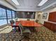 Meeting room with large table and pool view at 1280 W Peachtree W St # 1407, Atlanta, GA 30309