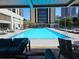 Relaxing rooftop pool with lounge chairs and patio furniture at 1280 W Peachtree W St # 1407, Atlanta, GA 30309