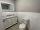 Modern bathroom with marble vanity and white tile at 2812 Arlington Rd, Atlanta, GA 30344