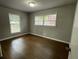 Well-lit bedroom featuring hardwood floors and neutral walls at 2812 Arlington Rd, Atlanta, GA 30344