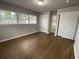 Spacious main bedroom with hardwood floors and en-suite bathroom at 2812 Arlington Rd, Atlanta, GA 30344