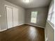 Spacious bedroom with hardwood floors and built-in closet at 2812 Arlington Rd, Atlanta, GA 30344
