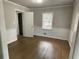 Well-lit bedroom with hardwood floors and neutral wall colors at 2812 Arlington Rd, Atlanta, GA 30344