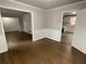Open dining area with hardwood floors, and views into the living room and kitchen at 2812 Arlington Rd, Atlanta, GA 30344