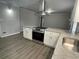 Modern kitchen with white cabinets, granite countertops, and stainless steel appliances at 2812 Arlington Rd, Atlanta, GA 30344