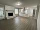 Living room with hardwood floors and a white brick fireplace at 2812 Arlington Rd, Atlanta, GA 30344