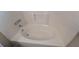 Clean oval bathtub with updated fixtures at 6627 Coventry Pt, Austell, GA 30168