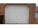 White garage door in a brick archway at 6627 Coventry Pt, Austell, GA 30168