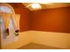 Bedroom featuring carpet flooring, window with blinds and curtains, and neutral wall paint at 10252 Commons Xing, Jonesboro, GA 30238