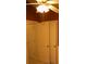 Interior view of a walk-in closet with neutral walls and multiple white doors at 10252 Commons Xing, Jonesboro, GA 30238