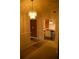 Cozy dining room with carpeted floor and stylish chandelier, next to kitchen at 10252 Commons Xing, Jonesboro, GA 30238