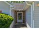 Inviting front entrance featuring stone accents and updated exterior features at 10252 Commons Xing, Jonesboro, GA 30238