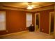 Spacious main bedroom with carpet, windows and ensuite bathroom with walk-in closet at 10252 Commons Xing, Jonesboro, GA 30238