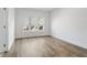 Bedroom features hardwood floors, natural light, and ample space at 11335 Bennett Ln, Johns Creek, GA 30097