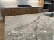 Close-up of a stunning granite kitchen countertop at 161 Mooney Rd, Woodstock, GA 30188