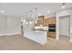 Well-designed kitchen featuring a large island, stainless steel appliances, and ample cabinet space at 161 Mooney Rd, Woodstock, GA 30188