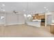Open-concept living area showcasing hardwood floors, recessed lighting, and a ceiling fan at 161 Mooney Rd, Woodstock, GA 30188